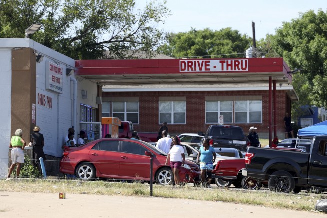 Shots fired into a crowd of hundreds after a holiday festival in Texas leave 3 dead, 8 injured