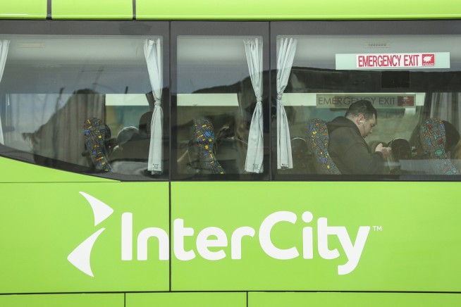 New Zealand woman arrested after 2-year-old girl found alive in suitcase stowed in bus luggage