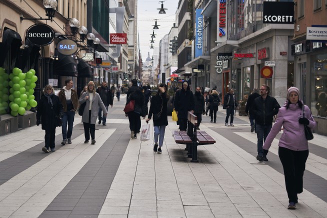 Off to the cafe: Sweden is outlier in virus restrictions