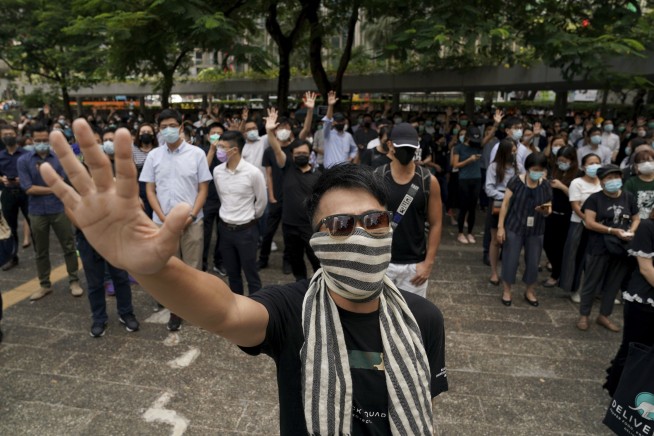 Hong Kong leader bans masks in hardening stance on protests