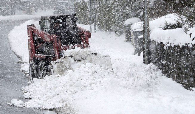 The Latest: Winter storm halts all flights in Dublin