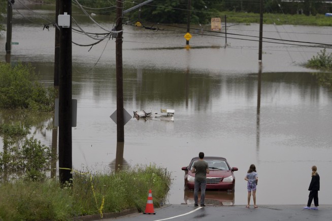 4 missing after record-breaking downpours along Canada's Atlantic coast cause flooding