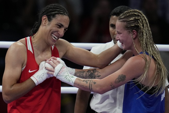 Algerian boxer Imane Khelif clinches medal at Olympics after outcry fueled by gender misconceptions