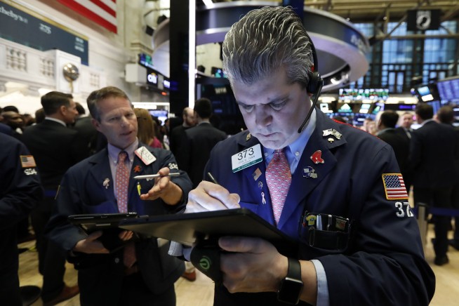 Markets Right Now: Stocks are closing at fresh record highs