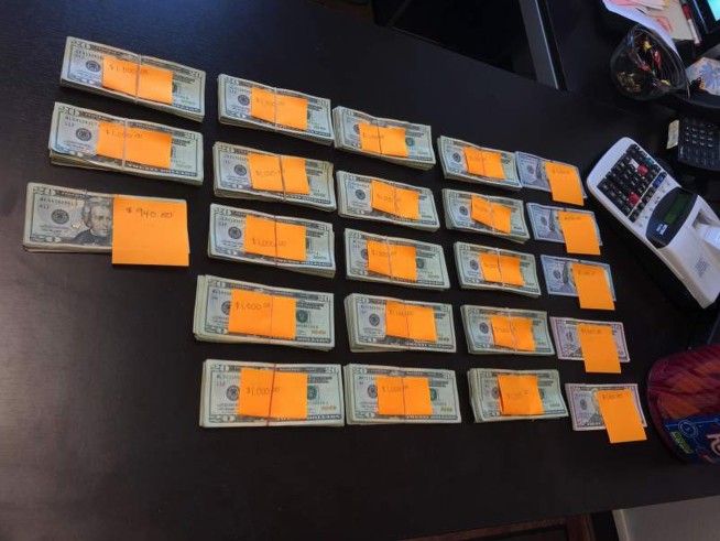 Man reunites with $23K found in recycling sorting facility