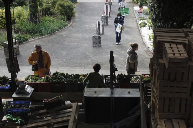 India opens some stores as virus restrictions ease elsewhere