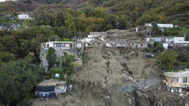 Italian rescuers search for missing in island landslide