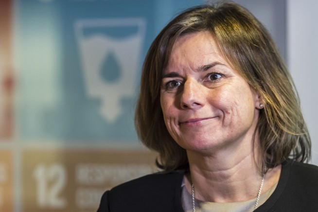 The Latest: EC leader questions Trump's grasp of Paris pact