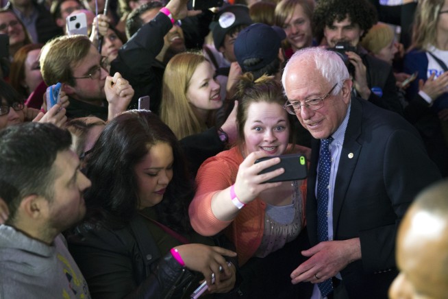 The Latest: Clinton wins Iowa Democratic caucuses