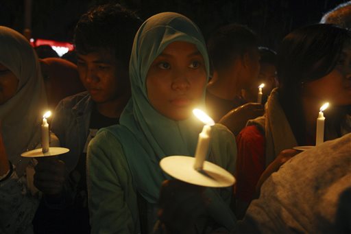 Bad weather hobbles Indonesia jet recovery; 7 bodies found