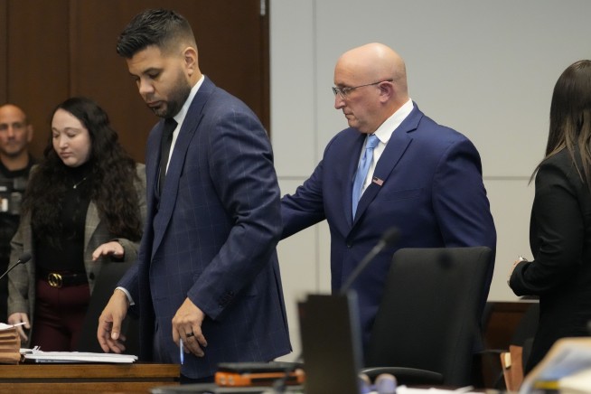 Father of July 4th parade shooting suspect pleads guilty to misdemeanors linked to son's gun license