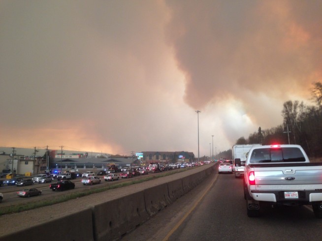 Alberta declares emergency as fires threaten Canada oil town