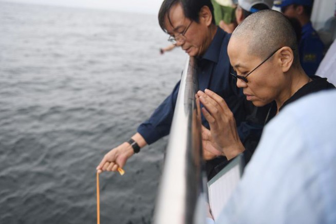 Family scatters jailed Chinese Nobel laureate's ashes in sea