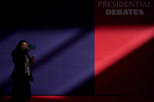 Crowds out, masks in: Debating in the age of the coronavirus