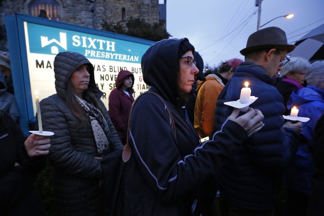 The Latest: Married couple, brothers among synagogue victims