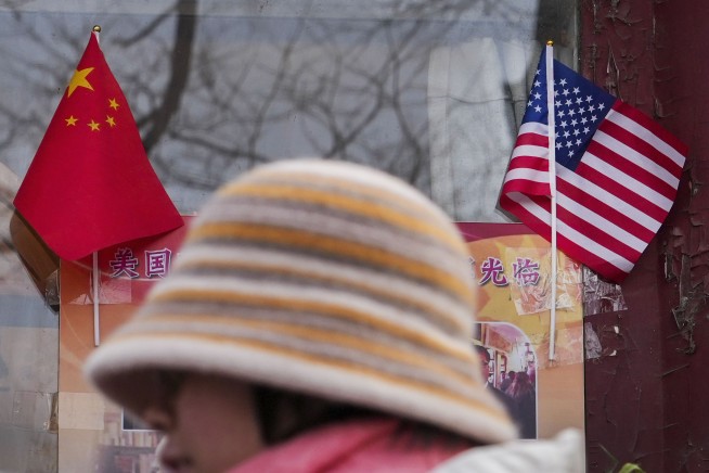 China slaps extra tariffs of up to 15% on imports of major US farm exports and adds trade limits