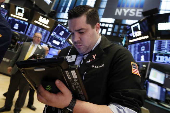 Markets Right Now: Stocks sink on China slowdown fears