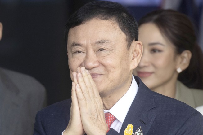 Thailand's king reduces former Prime Minister Thaksin's 8-year prison term to a single year