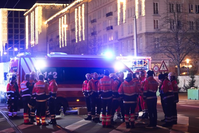 At least 2 dead and 60 hurt after a car drives into a German Christmas market in a suspected attack