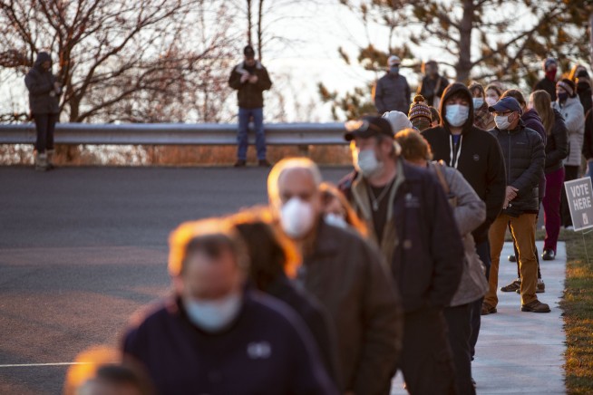 Record early vote leads to tranquil Election Day at polls