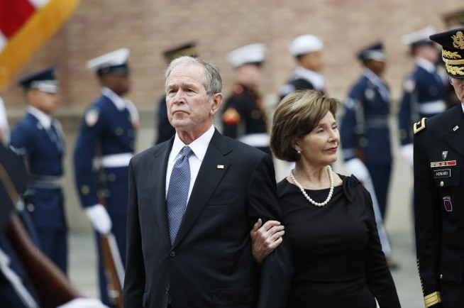 The Latest: Private, graveside service ends; Bush buried
