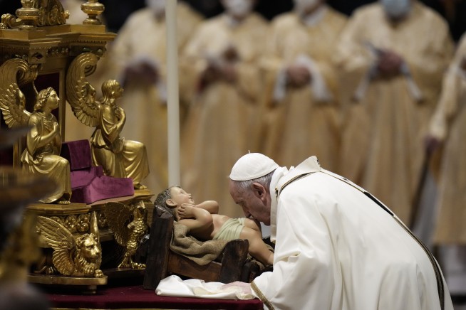Pope celebrates Christmas Eve Mass as virus surges in Italy