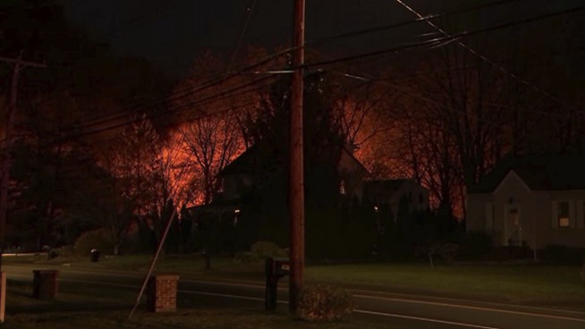 Fiery explosion at barricade scene injures up to 8 officers