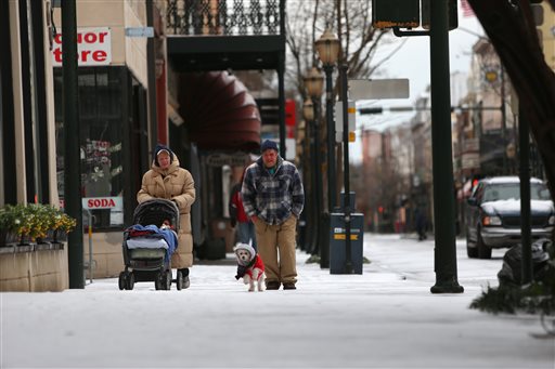 Snow, ice send South's flagship city reeling
