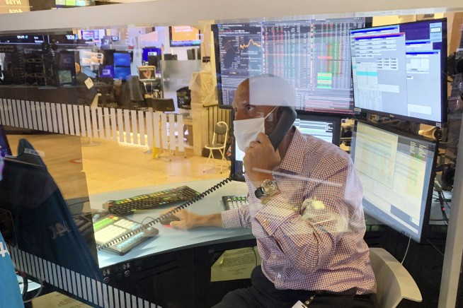 Wall Street drifts through more wobbly trading, yields fall