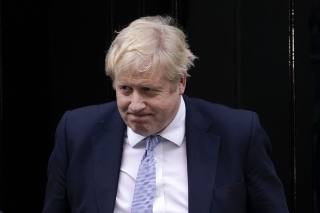 Boris Johnson says sorry after report slams lockdown parties