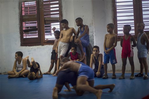 AP Photos: Children learn wrestling in Old Havana