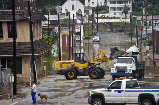 Crews rescue the stranded in West Virginia flooding; 23 dead