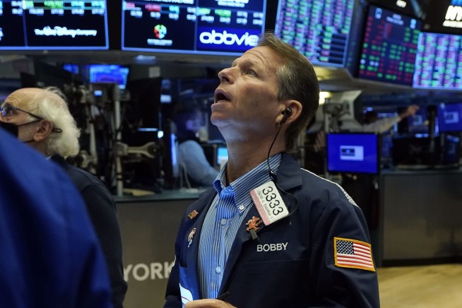 Stocks move lower, pull indexes below recent record highs