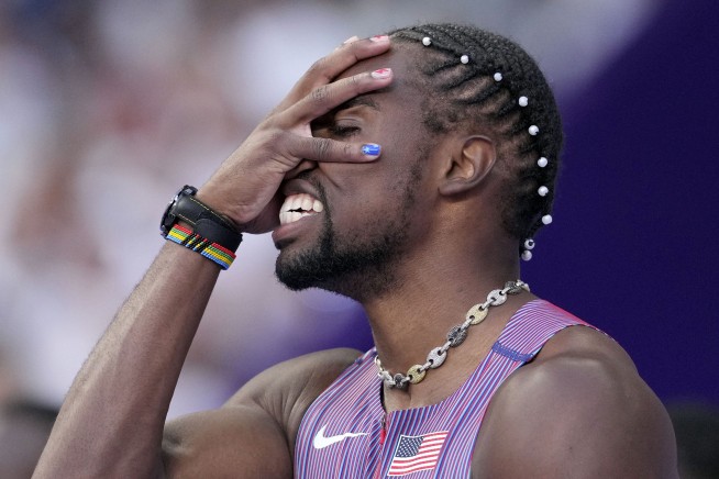 Noah Lyles wins a historically close Olympic 100-meter sprint by five-thousandths of a second