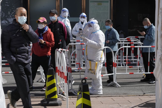 China battles multiple outbreaks, driven by stealth omicron