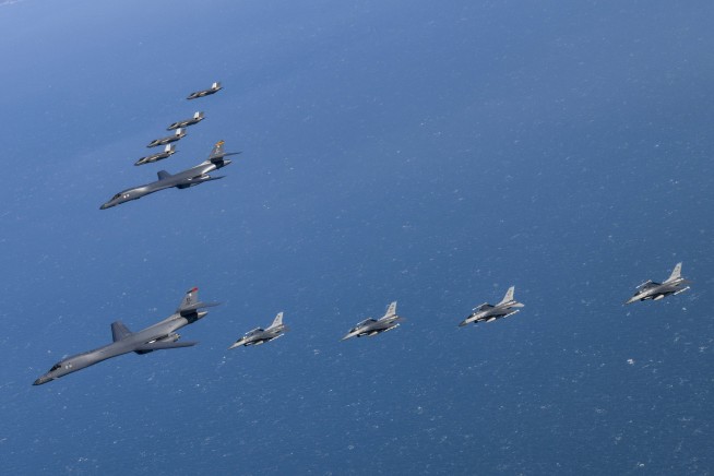 N. Korea makes fresh threats, US bombers fly after ICBM test