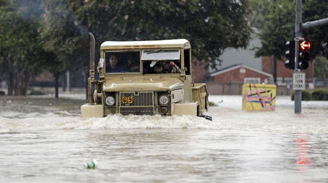 The Latest: Harvey continues slow trek back toward Gulf