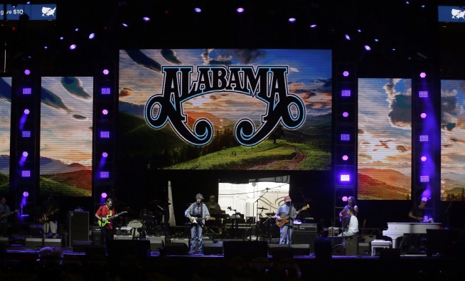 Former presidents call for unity at hurricane aid concert