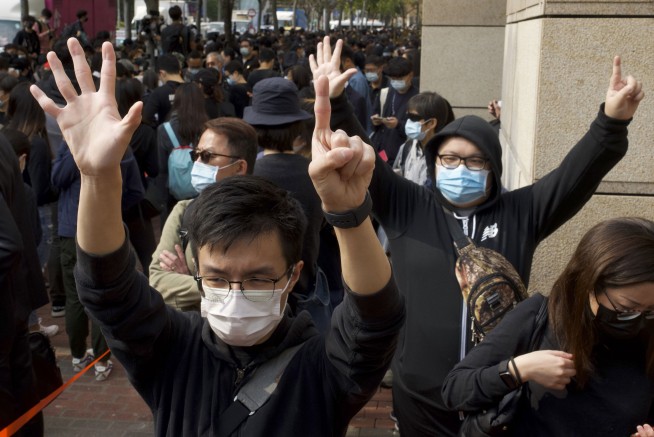 Pro-democracy activists brought to court in Hong Kong