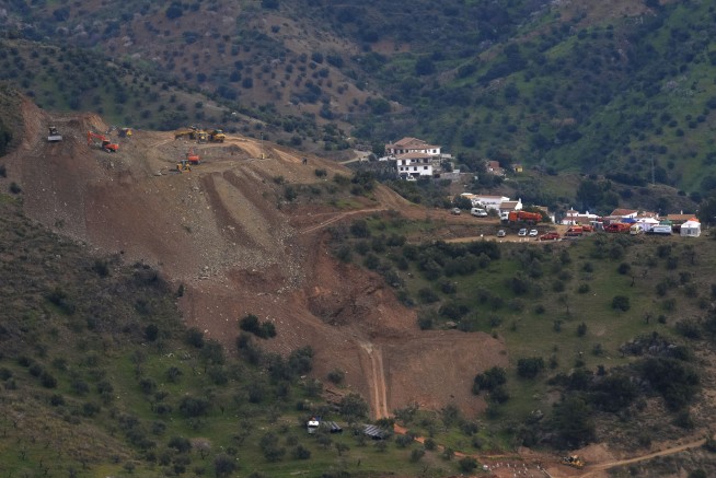 Spanish rescuers battle tough conditions to reach toddler