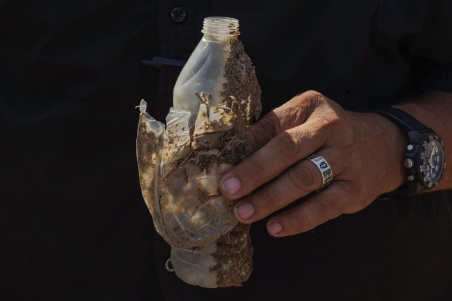 Barrels of drinking water for migrants walking through Texas have disappeared