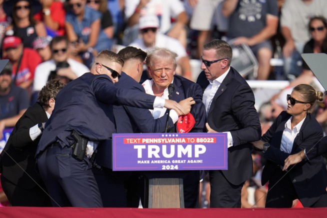 Trump injured but 'fine' after attempted assassination at rally, shooter and one attendee are dead