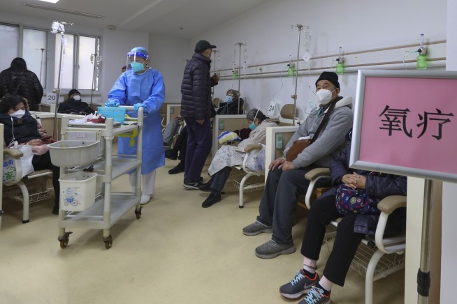 China seeks to minimize COVID-19 risk during travel rush