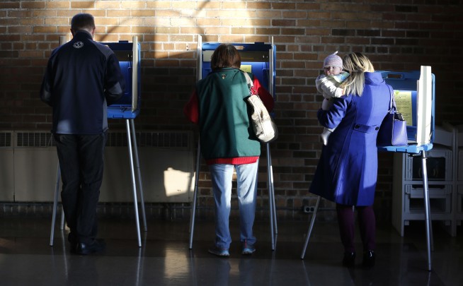 The Latest: Wisconsin voter turnout projected at 40 percent