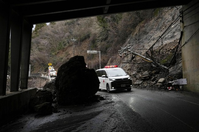 A woman in her 90s is rescued alive 5 days after Japan's deadly earthquake