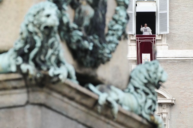 Pope Francis baptizes 21 babies in an annual ceremony at the Sistine Chapel