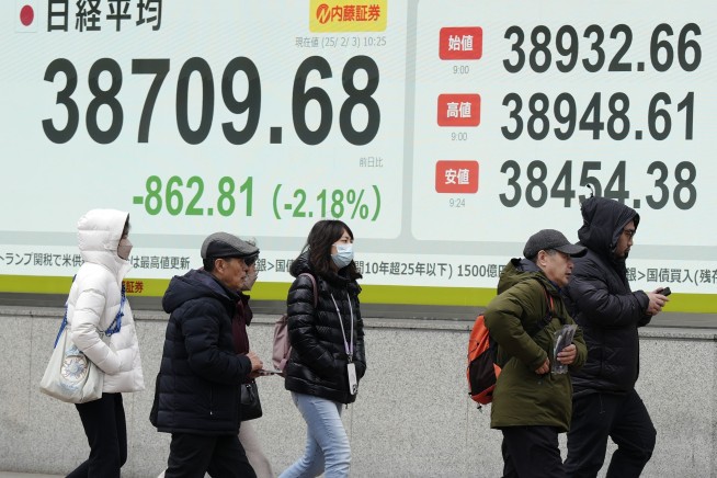 Wall Street falls following Trump's tariffs, but not as badly as feared in the morning