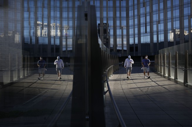 Muted and vacant, Las Vegas struggles to survive shutdown