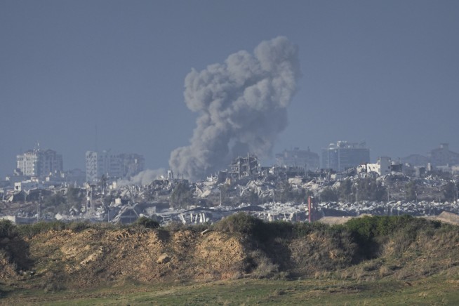 At least 68 killed in central Gaza in airstrike, adding to weekend's bloodshed