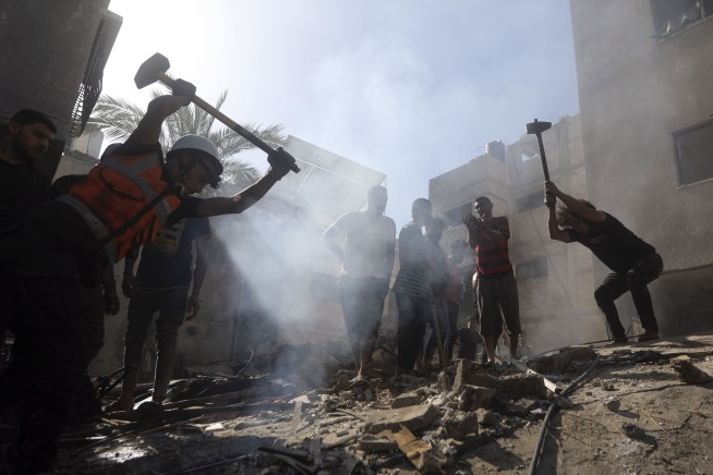 Israeli forces cut off north Gaza to isolate Hamas as an advance on the urban center looms